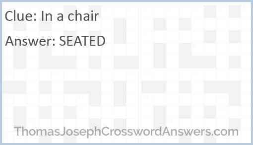 In a chair Answer